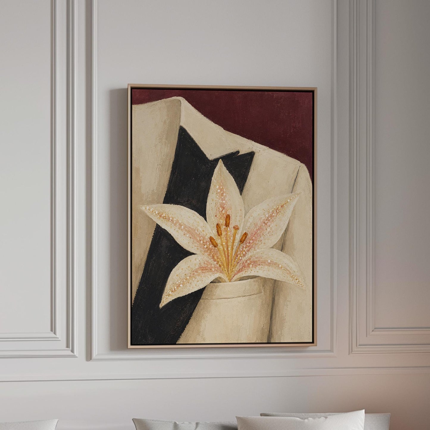 White pearl flecked lily on a cream tuxedo lapel over deep burgundy, canvas print in a bright room with natural daylight