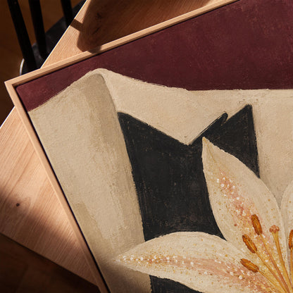 White pearl flecked lily on a cream tuxedo lapel over deep burgundy, canvas print in a warm, minimally styled interior