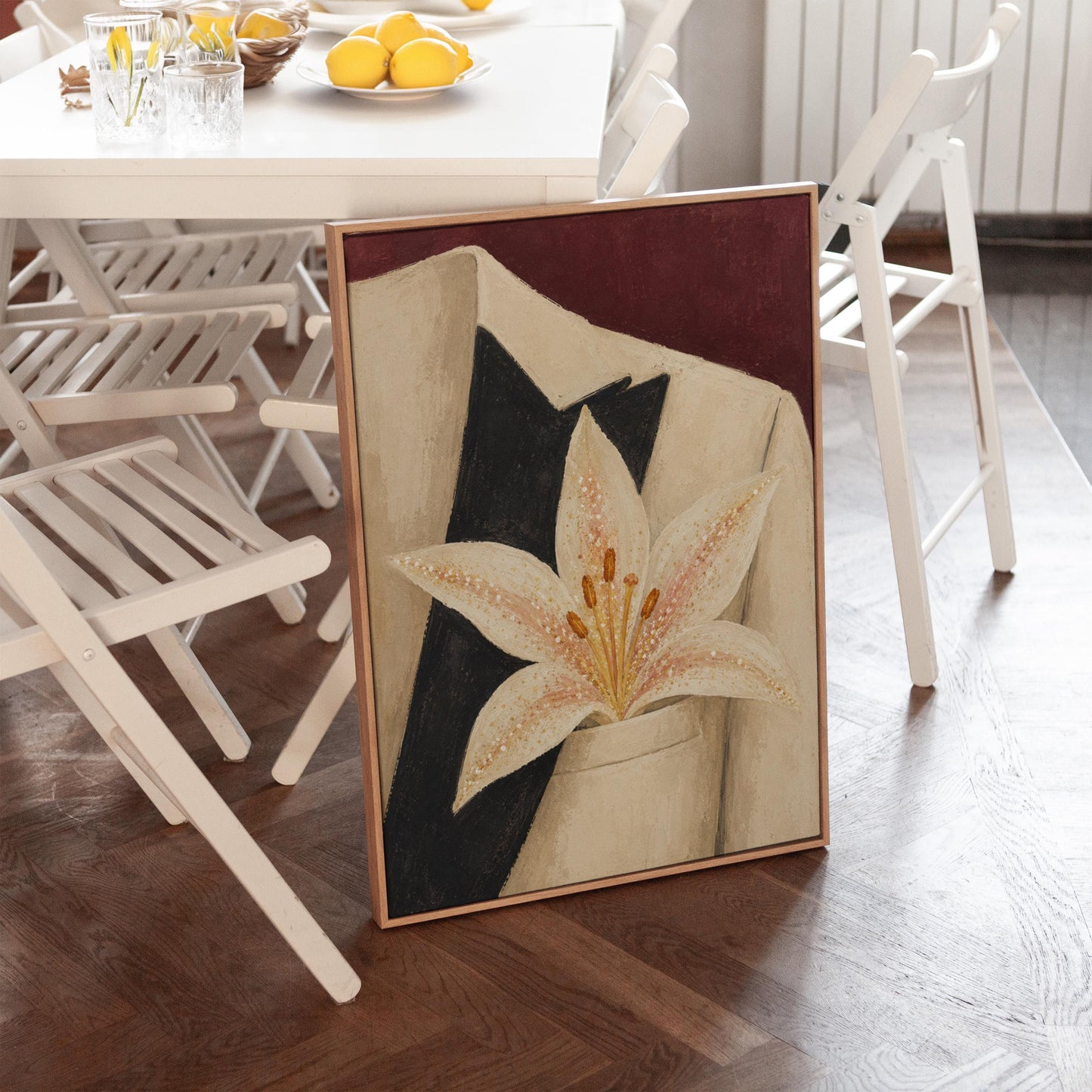 White pearl flecked lily on a cream tuxedo lapel over deep burgundy, canvas print on a quiet wall in a considered interior