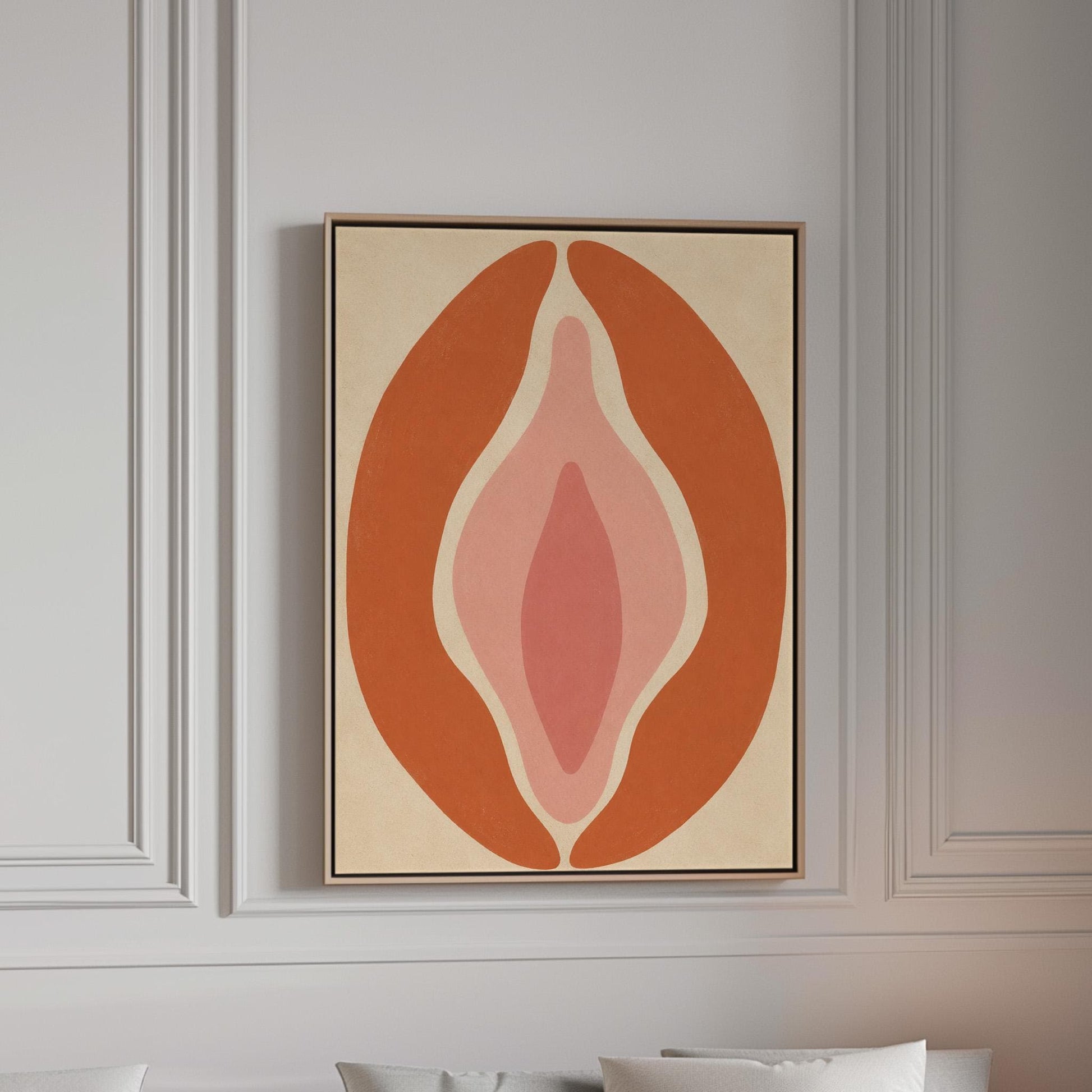 Tall terracotta oval enclosing soft layers of blush and pale rose, canvas print in a bright room with natural daylight