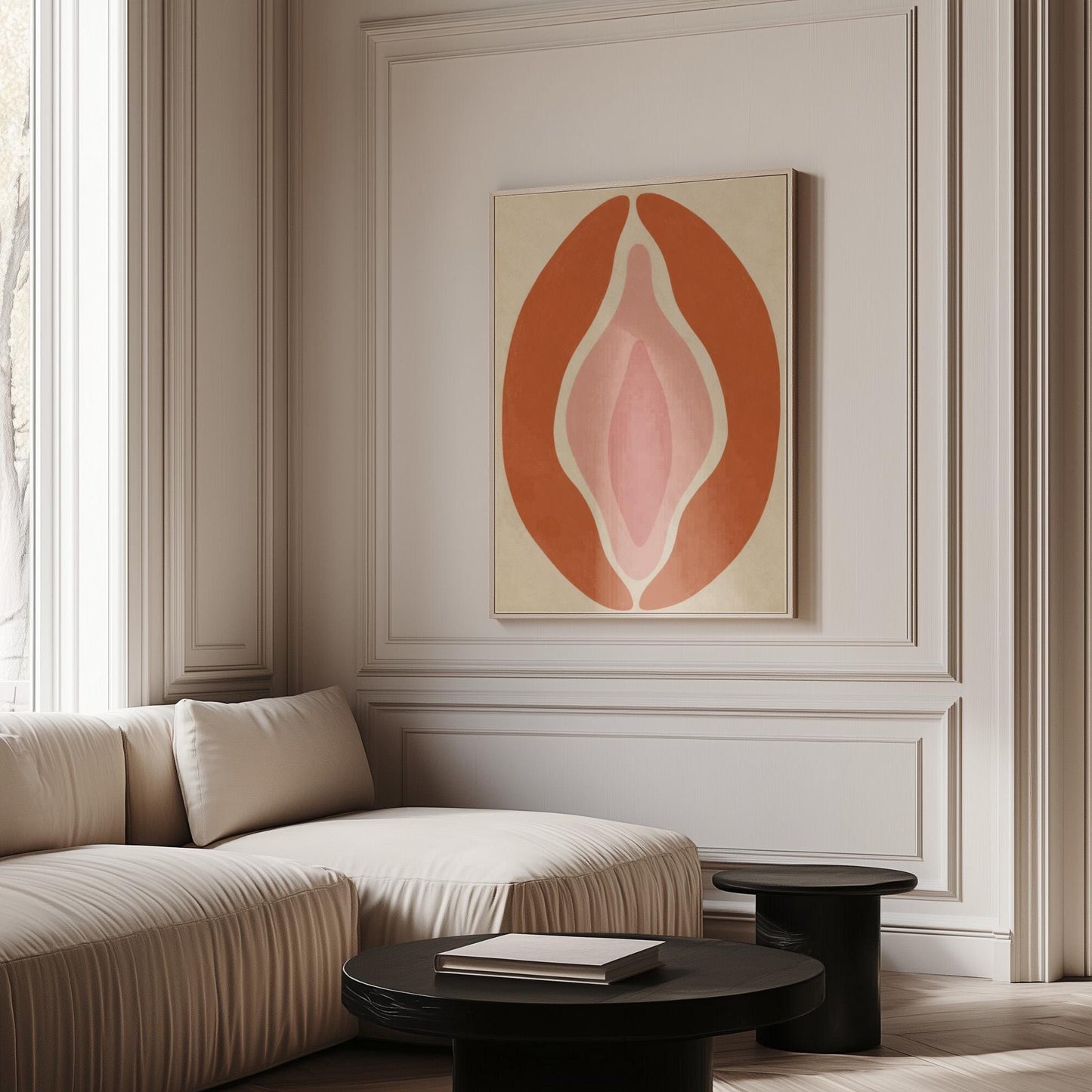 Tall terracotta oval enclosing soft layers of blush and pale rose, canvas print seen in a warm interior with natural light