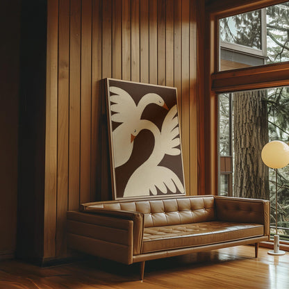 Two cream doves with orange beaks crossing wings on dark brown, canvas wall art seen in a warm interior with natural light