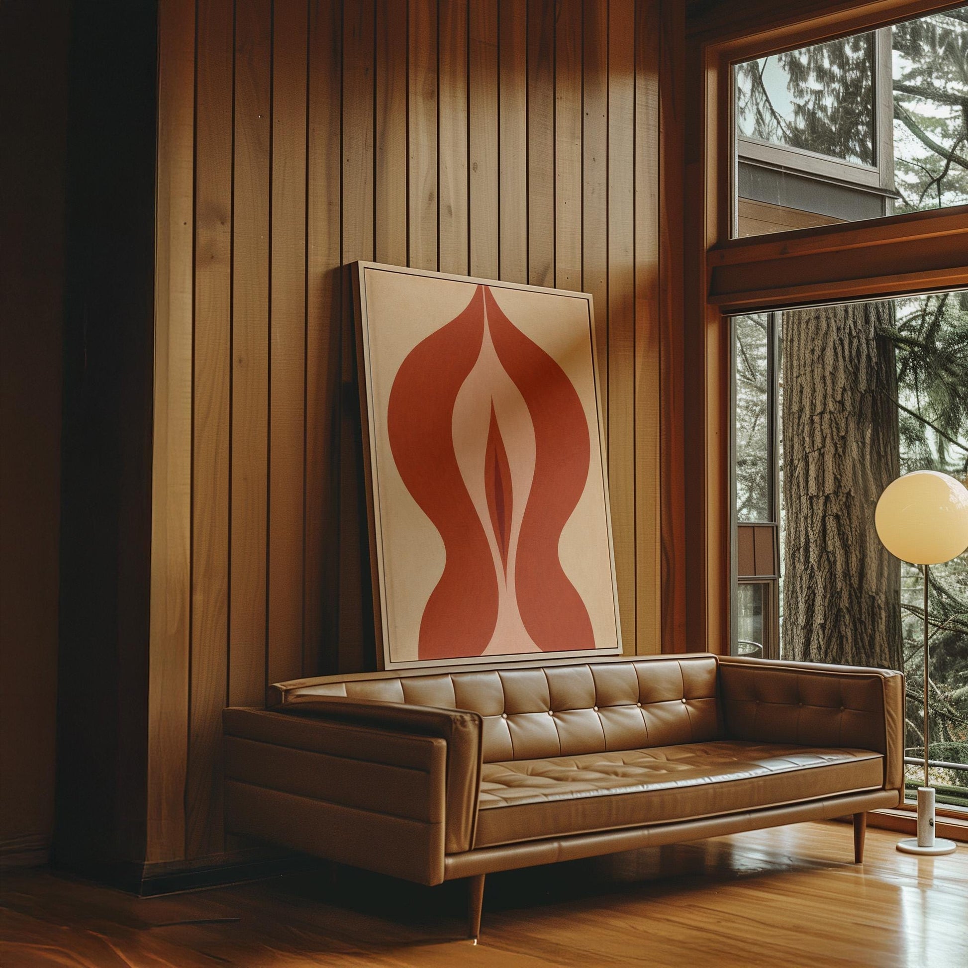 Rust red flame shaped form opening into blush and grey on sand, canvas wall art presented in a light, minimal room