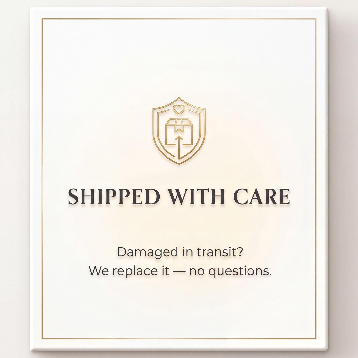 a sign that reads "SHIPPED WITH CARE" and includes a shield-shaped logo with a heart and an arrow. Below the sign, there is a message that reads "Damaged in transit? We replace it - no questions."