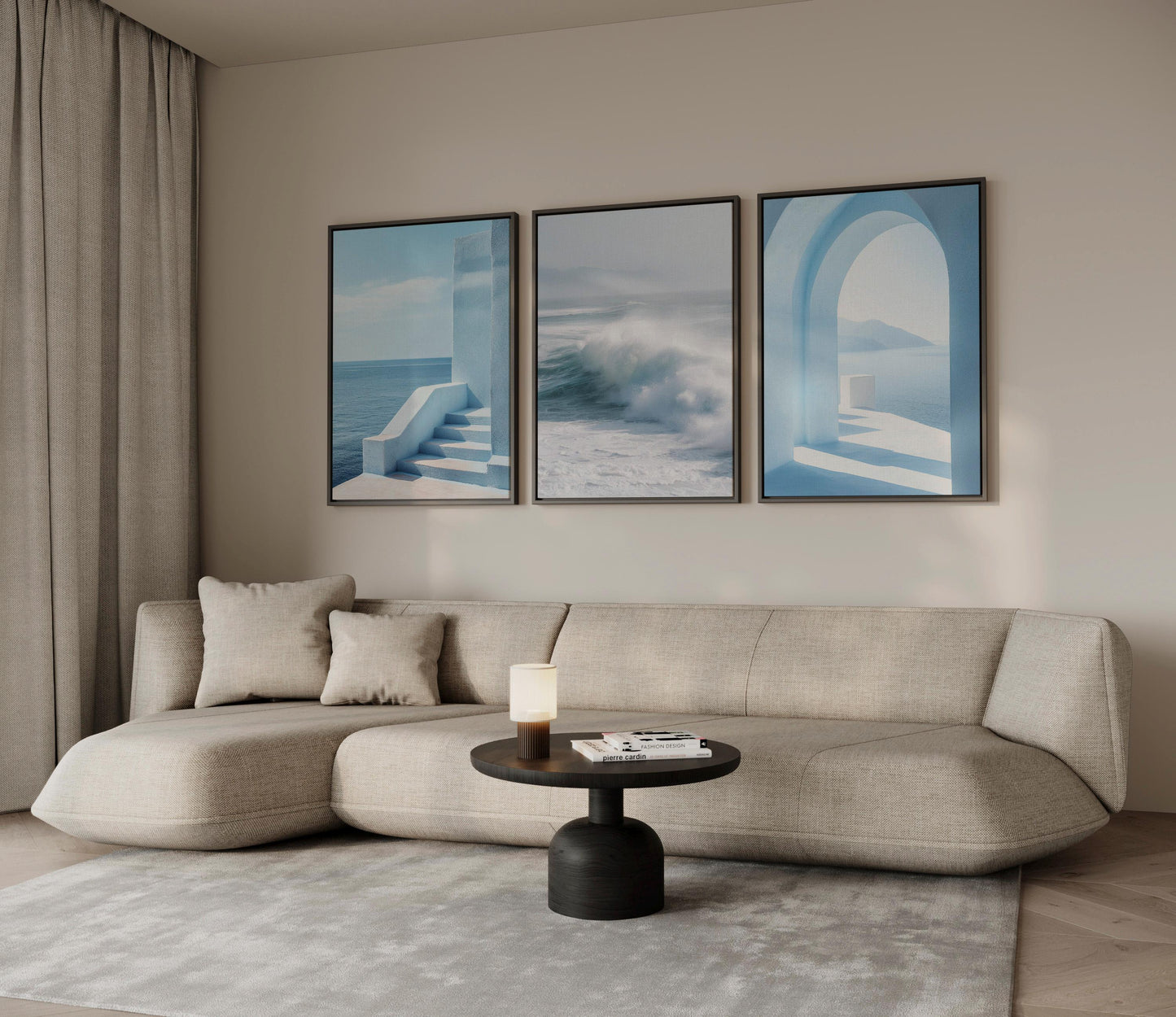 a modern living room with a beige sofa, a round coffee table, and three framed artworks hanging on the wall above the sofa.