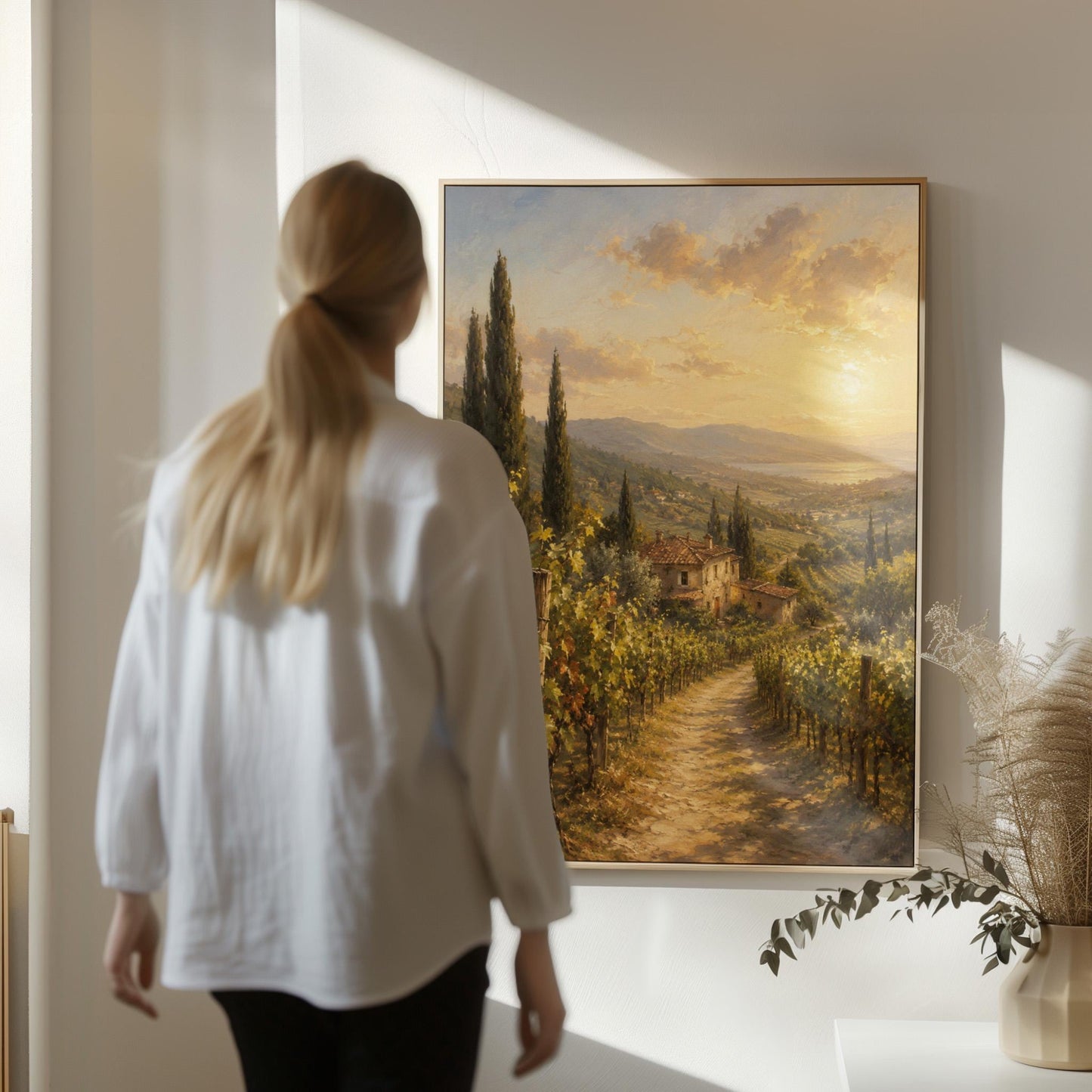 Tuscan vineyard at sunset with a stone farmhouse, canvas print on a quiet wall in a considered interior