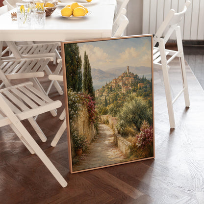 Stone path leading to an Italian hilltop village, canvas wall art presented in a light, minimal room