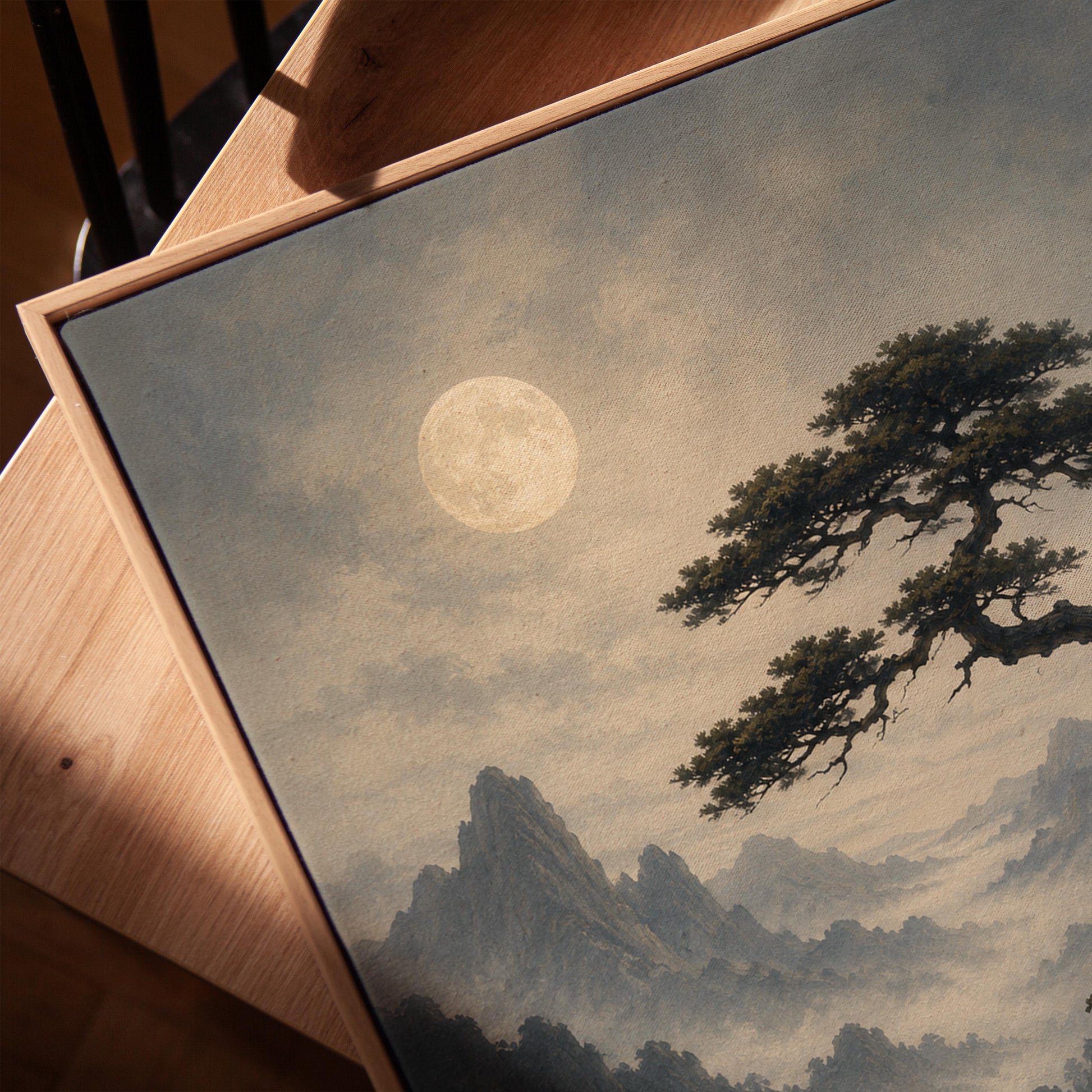Moonlit misty mountains with a windswept pine tree, canvas print in a warm, minimally styled interior
