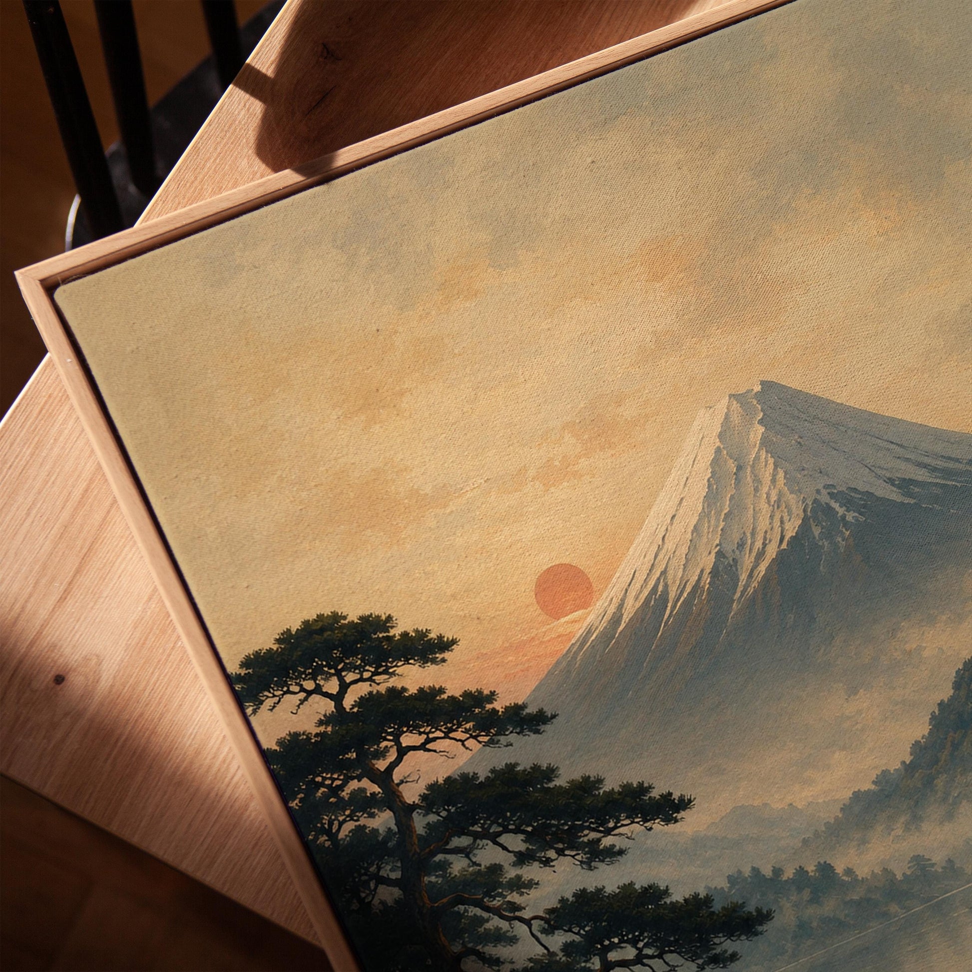 Snow-capped Mount Fuji at sunrise over a still lake, canvas print in a warm, minimally styled interior