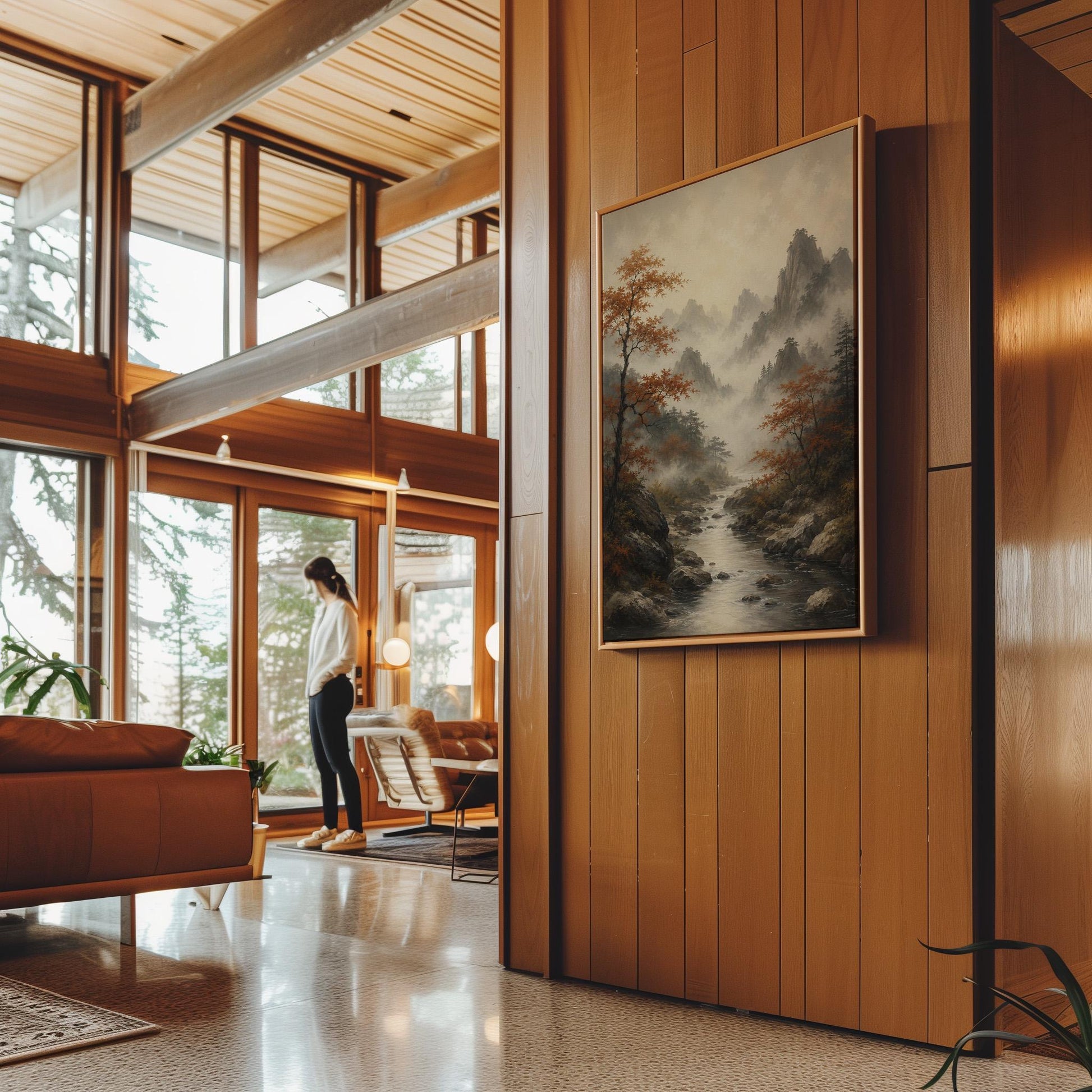 Autumn maples along a misty mountain stream, canvas wall art seen in a warm interior with natural light