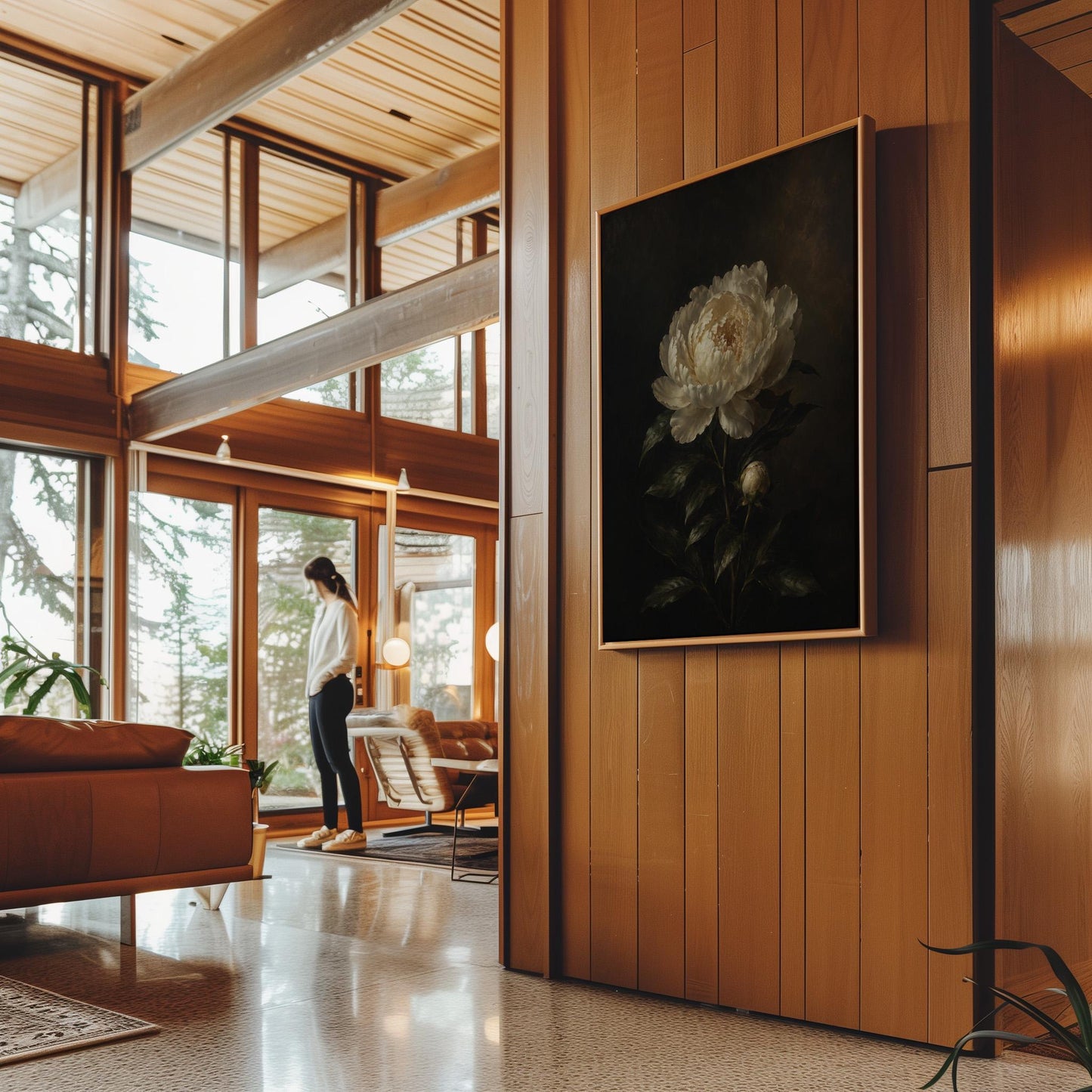 White peony in full bloom against a dark background, canvas print hanging in a calm, modern living space