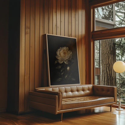 White peony in full bloom against a dark background, canvas print shown in a sunlit, contemporary room