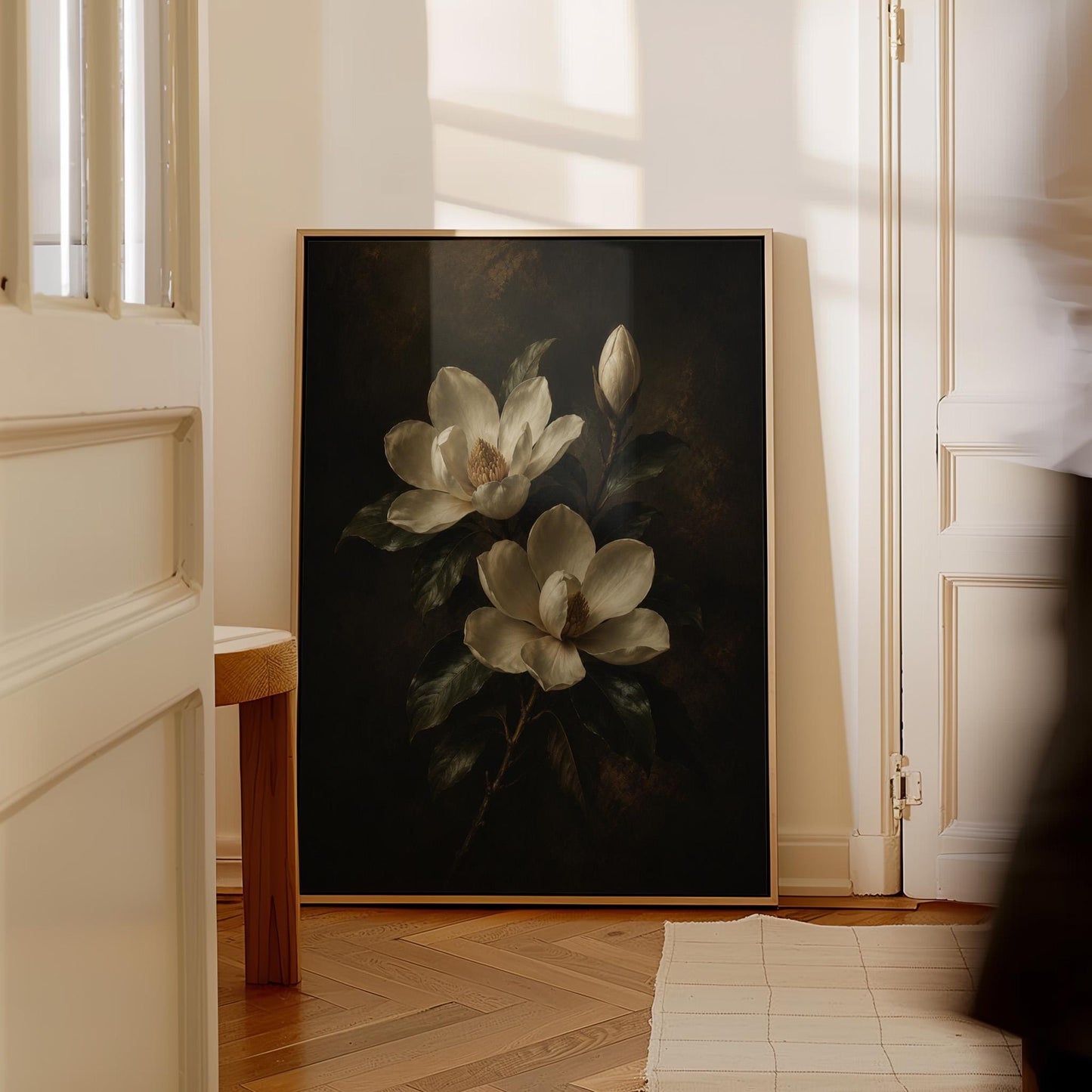 Cream magnolia blooms and dark glossy leaves, canvas print seen in a warm interior with natural light