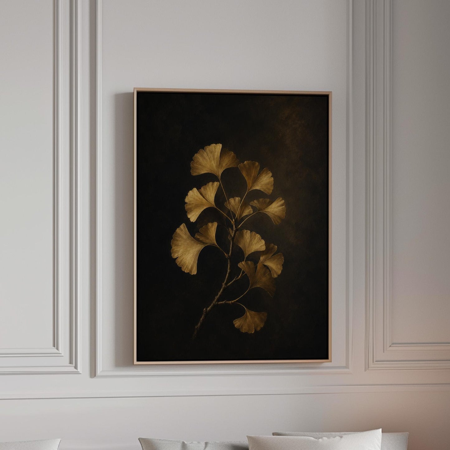 Golden ginkgo branch on a deep charcoal ground, canvas print in a bright room with natural daylight