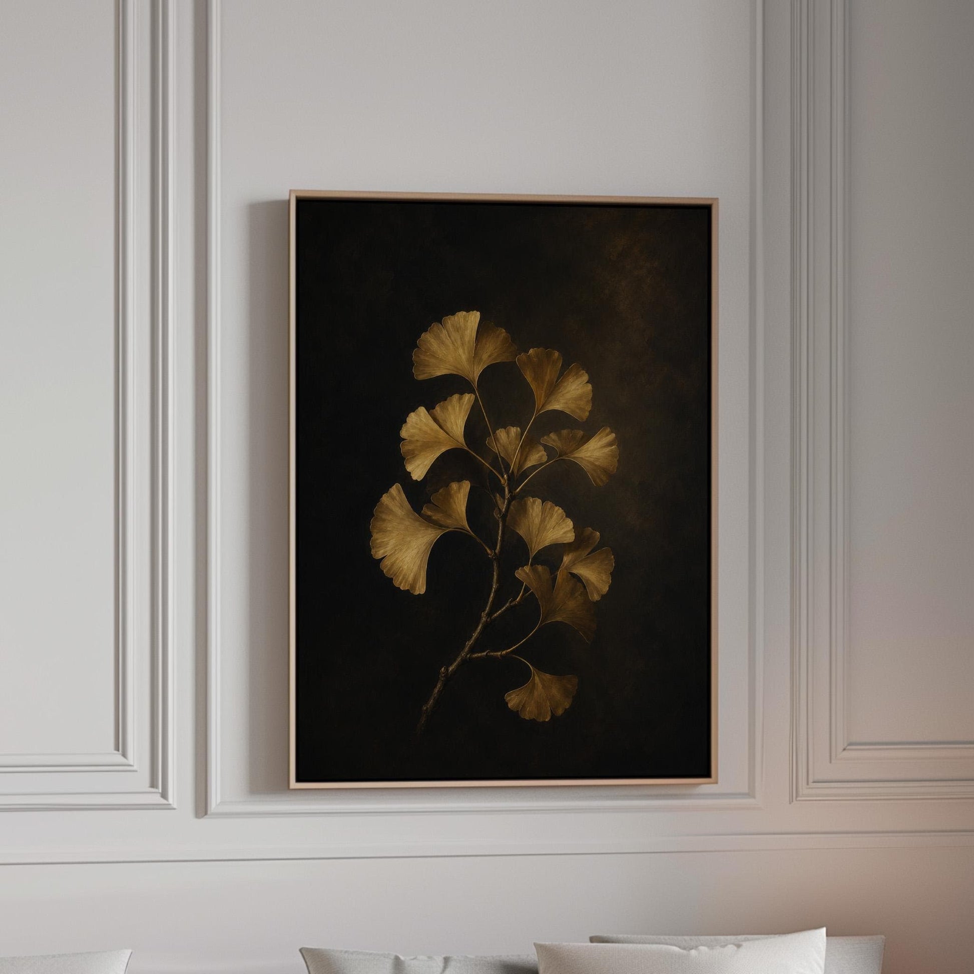 Golden ginkgo branch on a deep charcoal ground, canvas print in a bright room with natural daylight