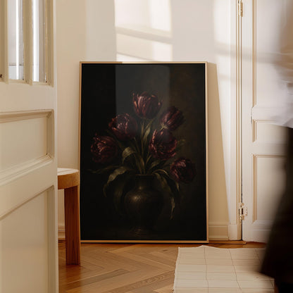 Deep burgundy tulips in a dark metal vase, canvas wall art seen in a warm interior with natural light