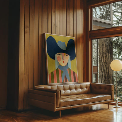 Folk cowgirl in an oversized navy hat and blue neckerchief on mustard, canvas print presented in a light, minimal room