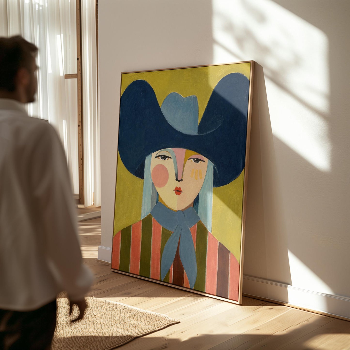 Folk cowgirl in an oversized navy hat and blue neckerchief on mustard, canvas wall art presented in a light, minimal room