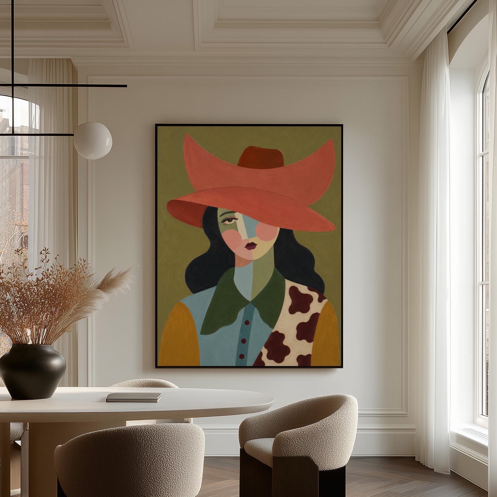 Cowgirl in a wide coral hat with a cubist face and cow-print collar on olive, canvas wall art hanging in a calm, modern living space