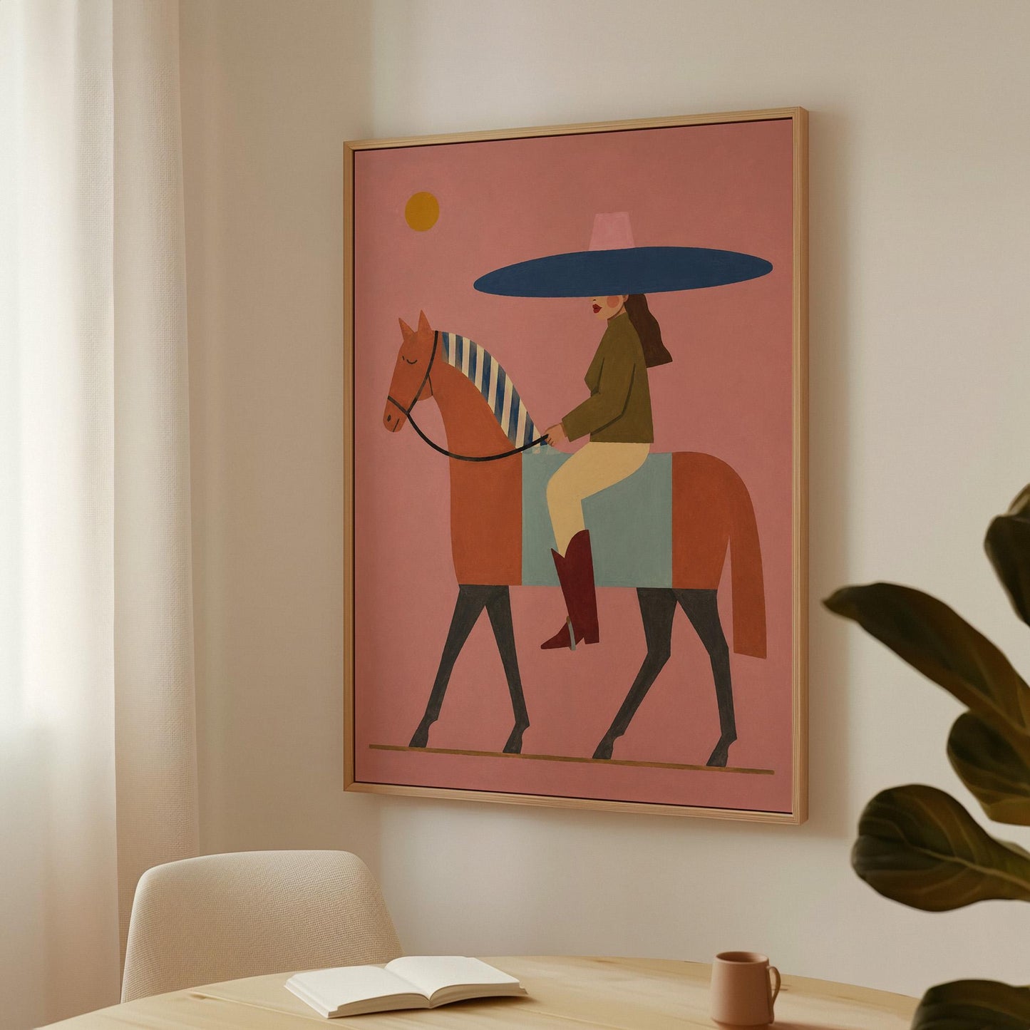 Woman in a wide navy hat riding a chestnut horse in profile on coral pink, canvas print shown in a sunlit, contemporary room
