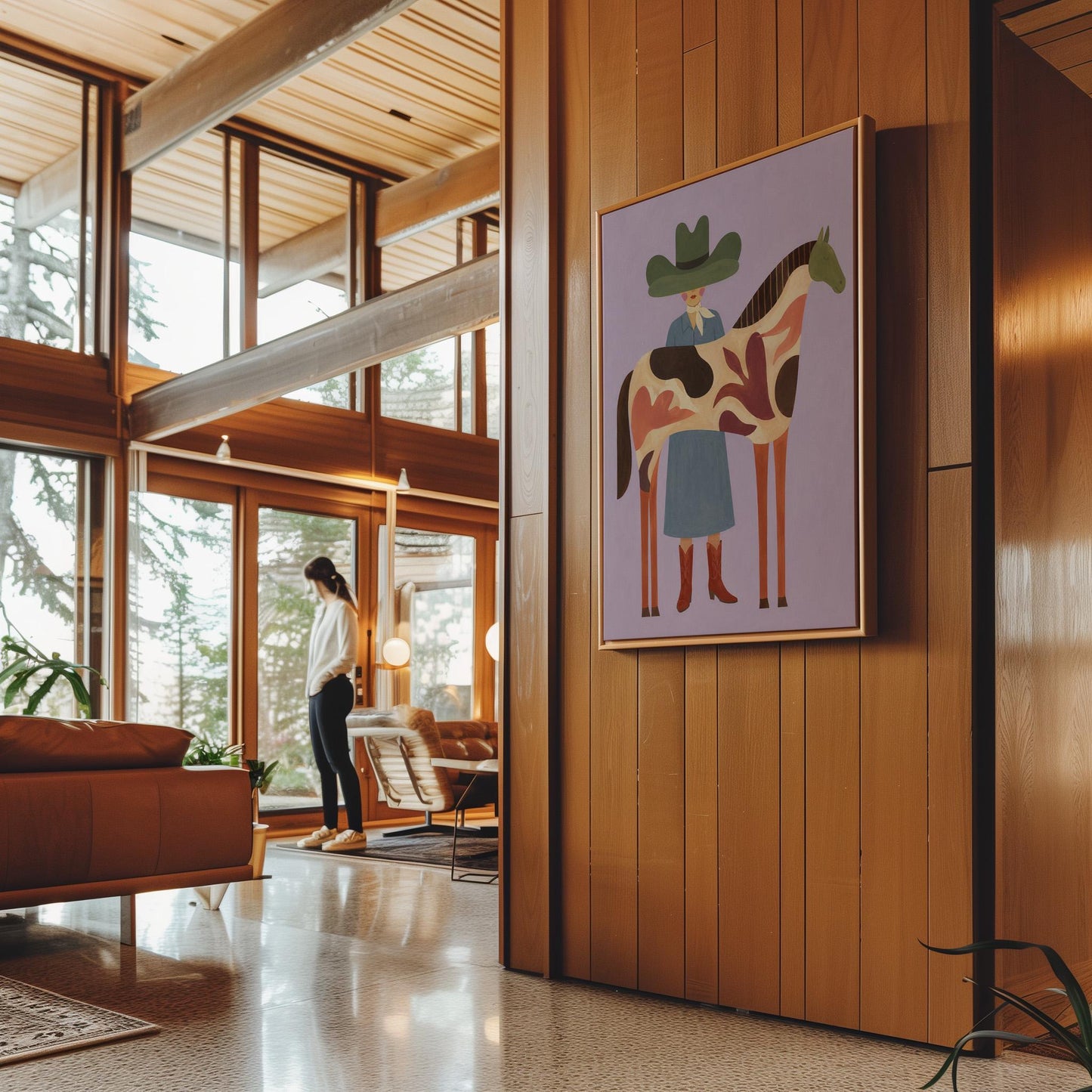 Cowgirl in a green hat beside a tall patterned horse on soft lilac, canvas print seen in a warm interior with natural light