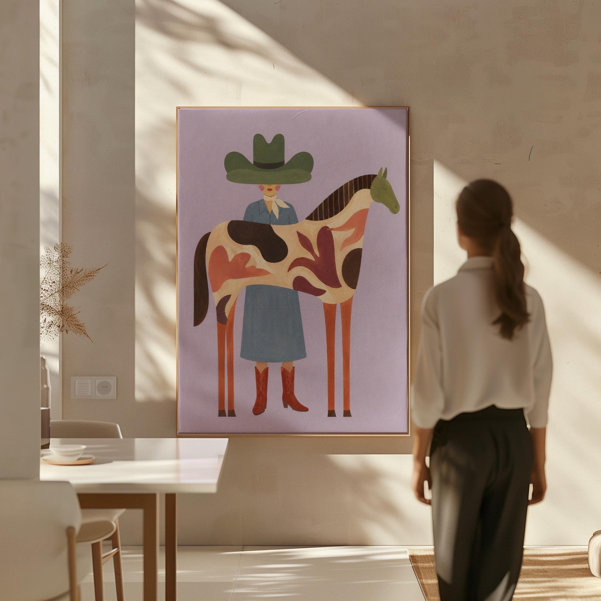 Cowgirl in a green hat beside a tall patterned horse on soft lilac, canvas print on a quiet wall in a considered interior