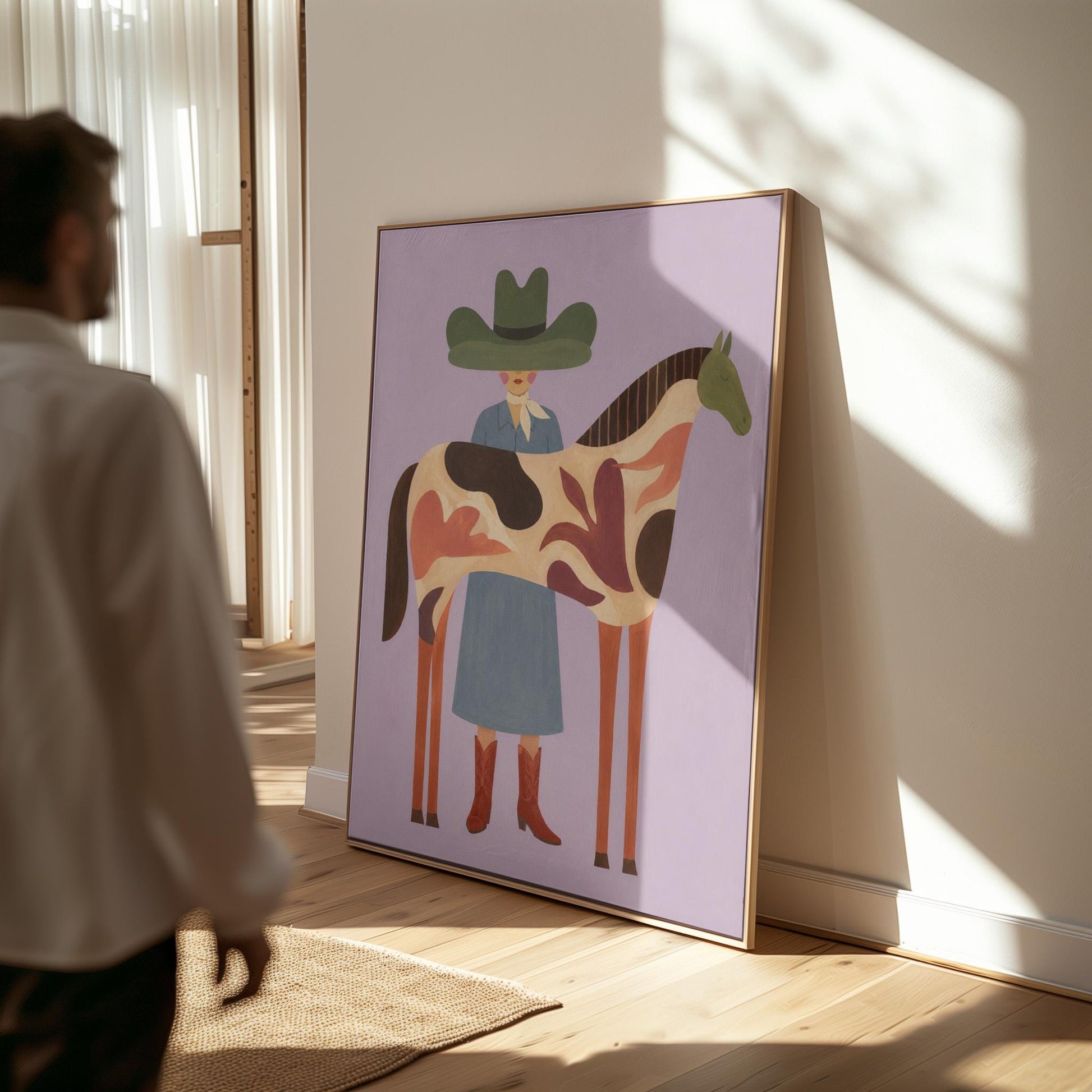 Cowgirl in a green hat beside a tall patterned horse on soft lilac, canvas wall art styled against a soft white wall