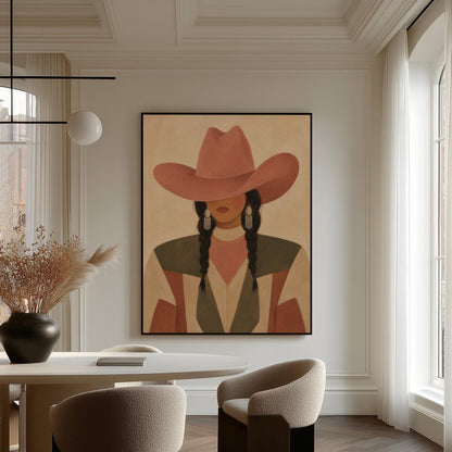 Cowgirl with dark braids under a wide terracotta hat and earthy western jacket, canvas print presented in a light, minimal room