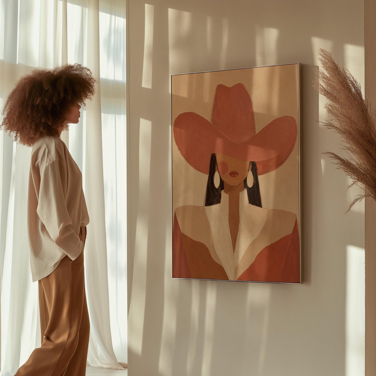 Minimal cowgirl in a coral hat and white collar with dark hair on cream, canvas print on a quiet wall in a considered interior