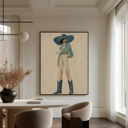 Full-figure cowgirl in a wide teal hat, blouse and boots with cream trousers, canvas print hanging in a calm, modern living space