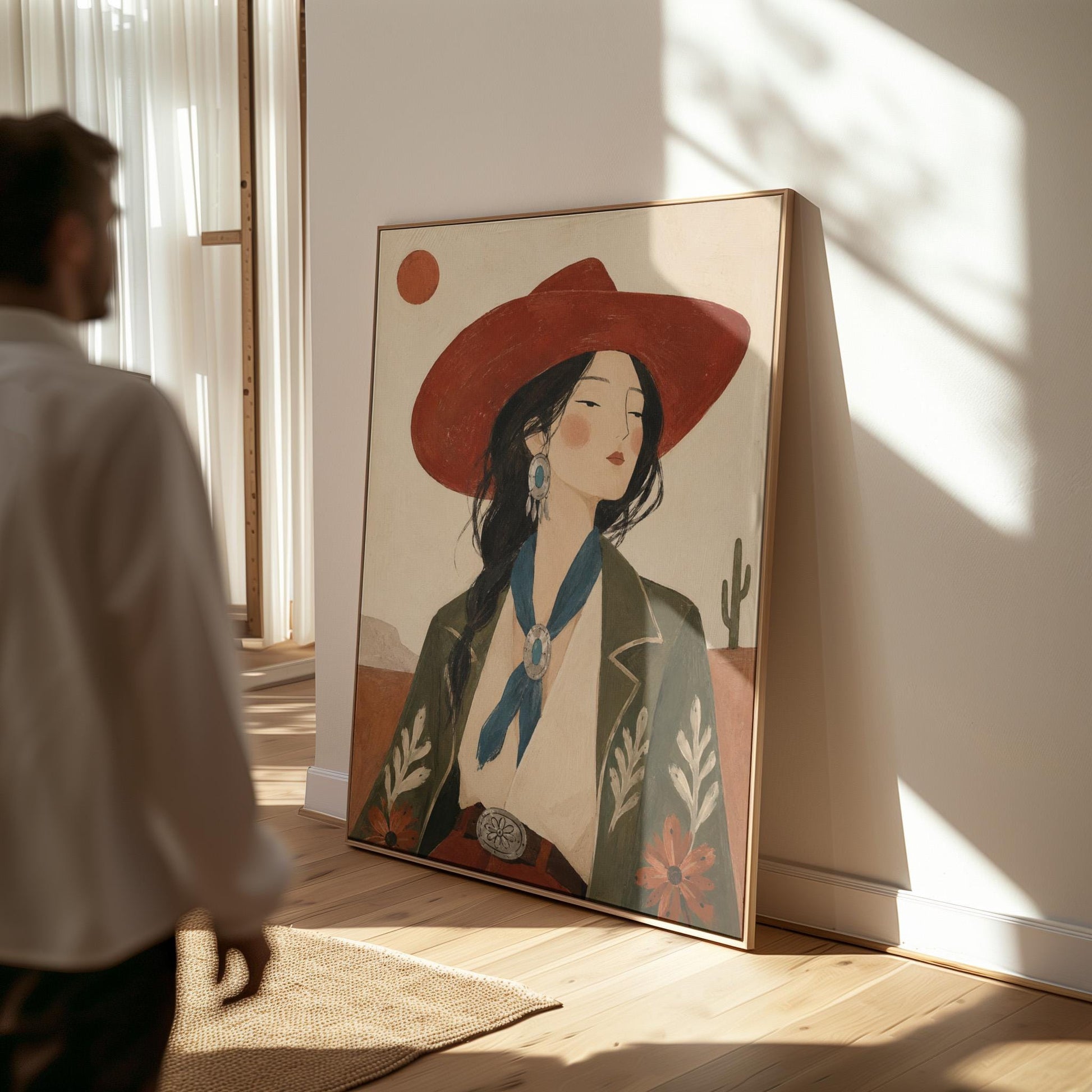 Cowgirl in a red hat and embroidered jacket with turquoise jewelry in the desert, canvas print on a quiet wall in a considered interior