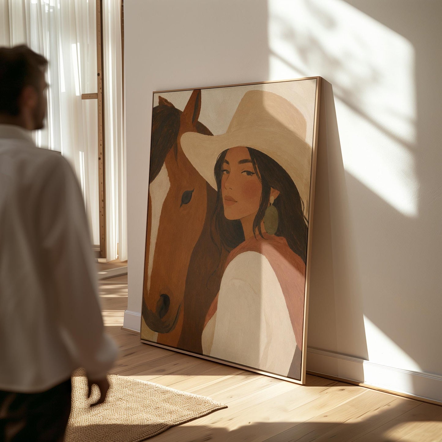Cowgirl in a cream hat leaning cheek to cheek with a chestnut horse on warm tan, canvas print styled against a soft white wall