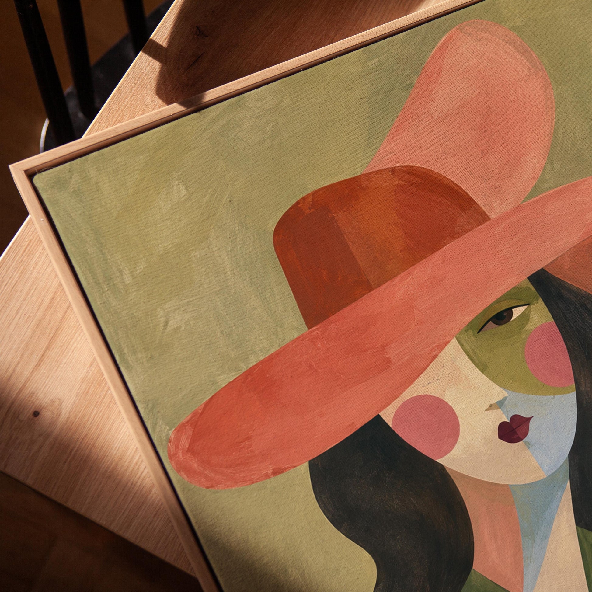 Abstract cowgirl in a wide coral hat with a cow print vest and dark hair, canvas print in a warm, minimally styled interior