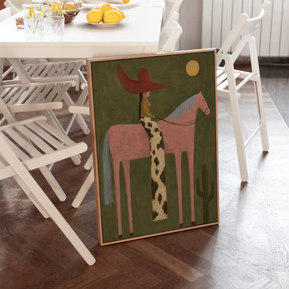 Cowgirl in a red hat riding a tall pink horse past a cactus under the moon, canvas print shown in a sunlit, contemporary room