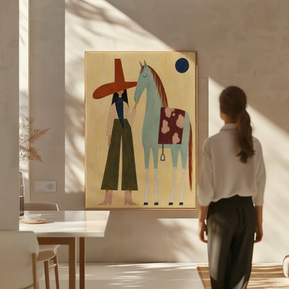 Woman in a wide red hat standing beside a gentle blue horse in the desert, canvas print displayed on a neutral wall in a styled interior