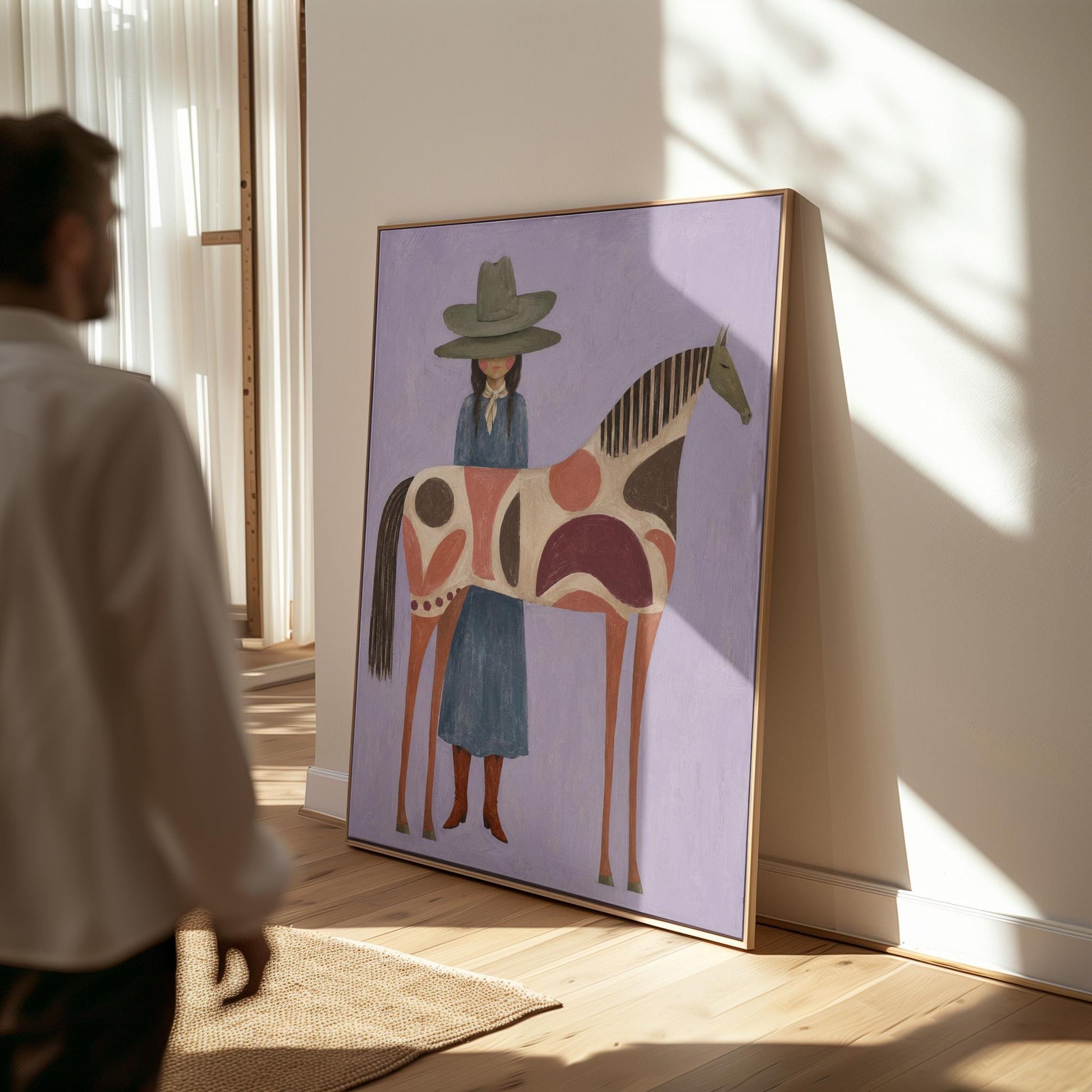 Woman in an olive hat before a patterned folk horse on a lavender ground, canvas wall art hanging in a calm, modern living space
