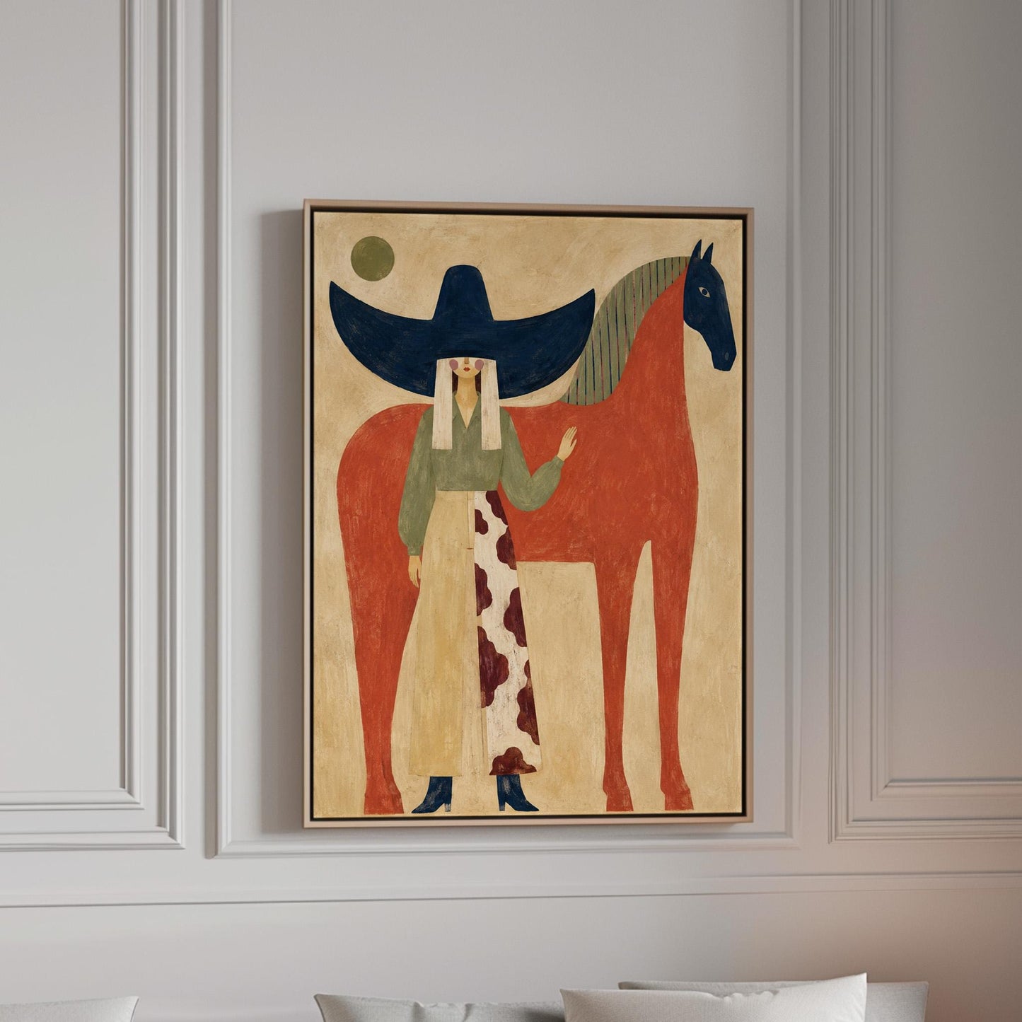 Woman in a navy hat standing by a red horse with a dark head under a moon, canvas print in a bright room with natural daylight