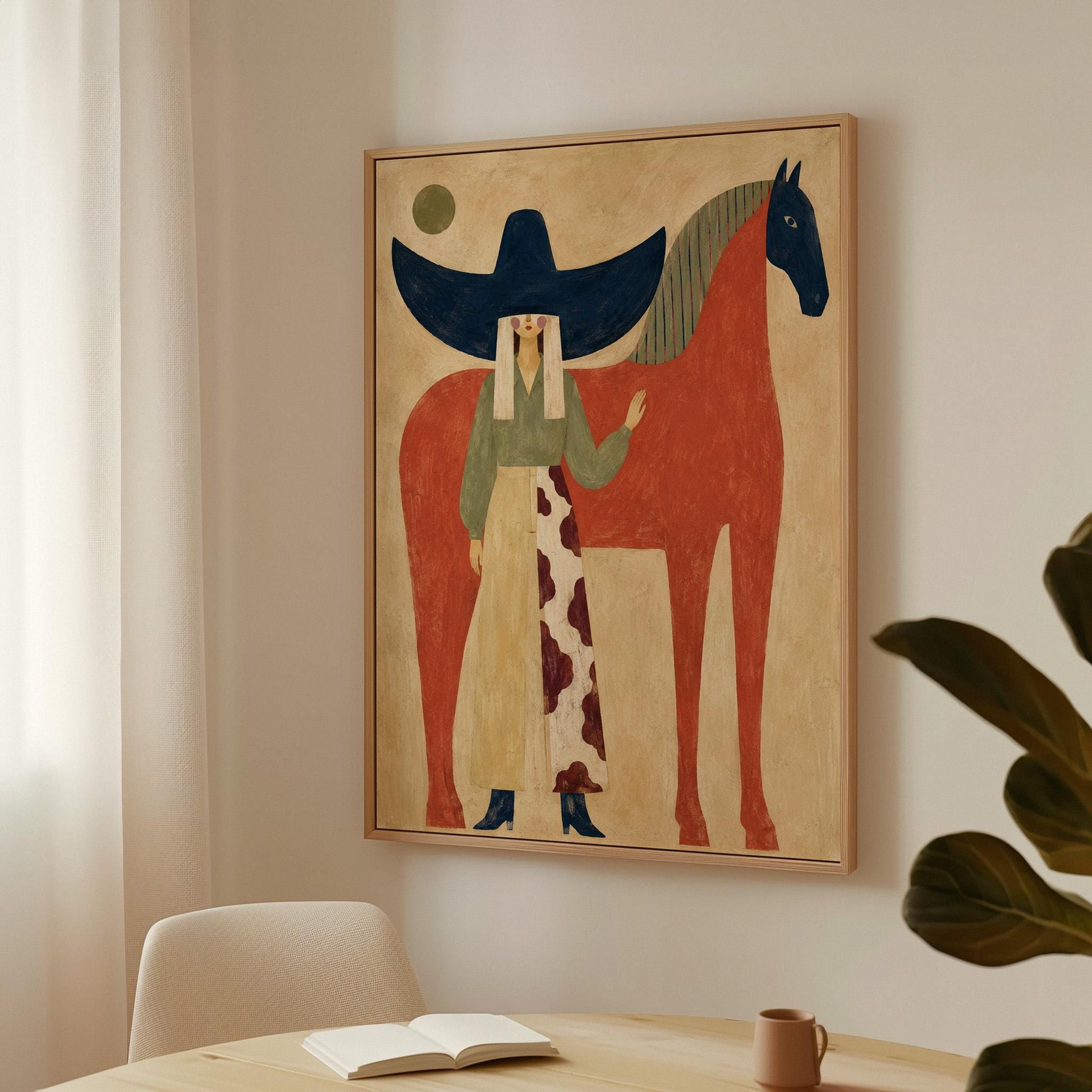 Woman in a navy hat standing by a red horse with a dark head under a moon, canvas wall art on a quiet wall in a considered interior
