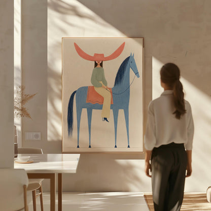 Cowgirl in a dramatic red hat riding a slender blue horse across pale sand, canvas wall art hanging in a calm, modern living space