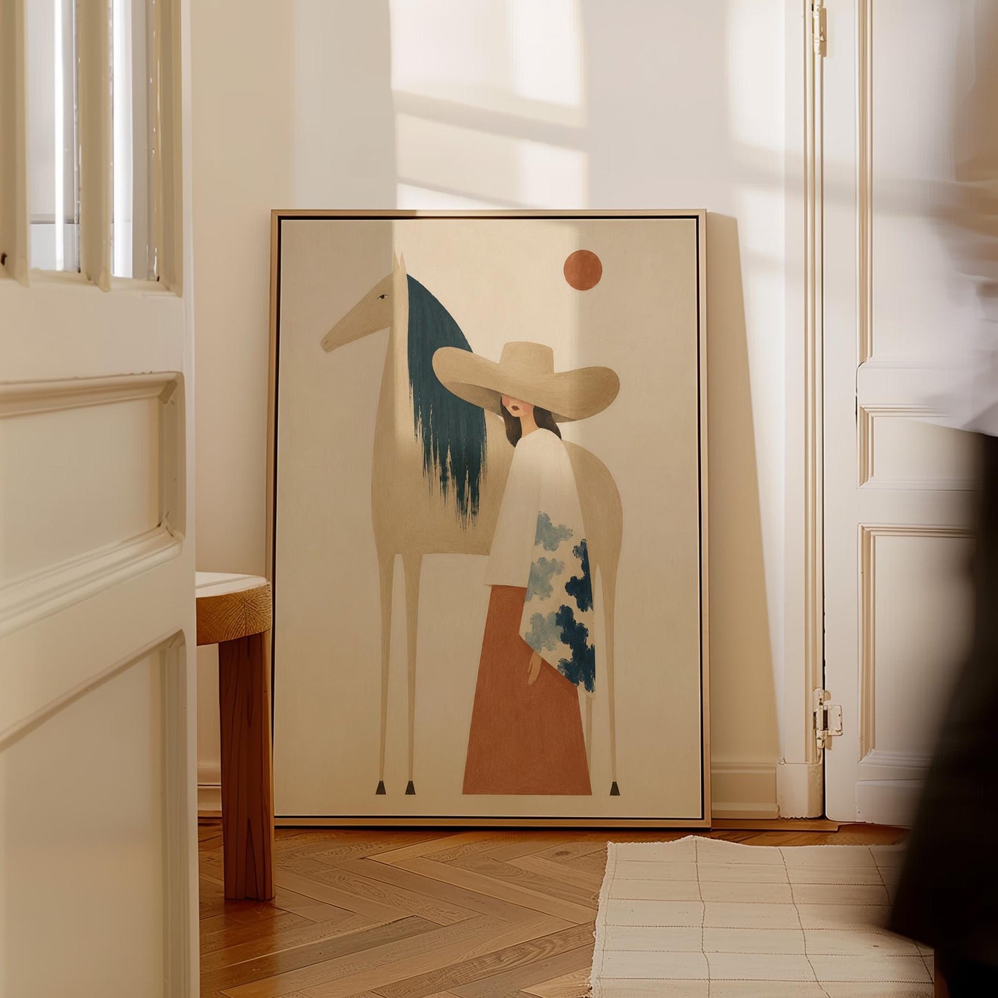Woman in a broad tan hat beside a cream horse with a teal mane at sunset, canvas print seen in a warm interior with natural light