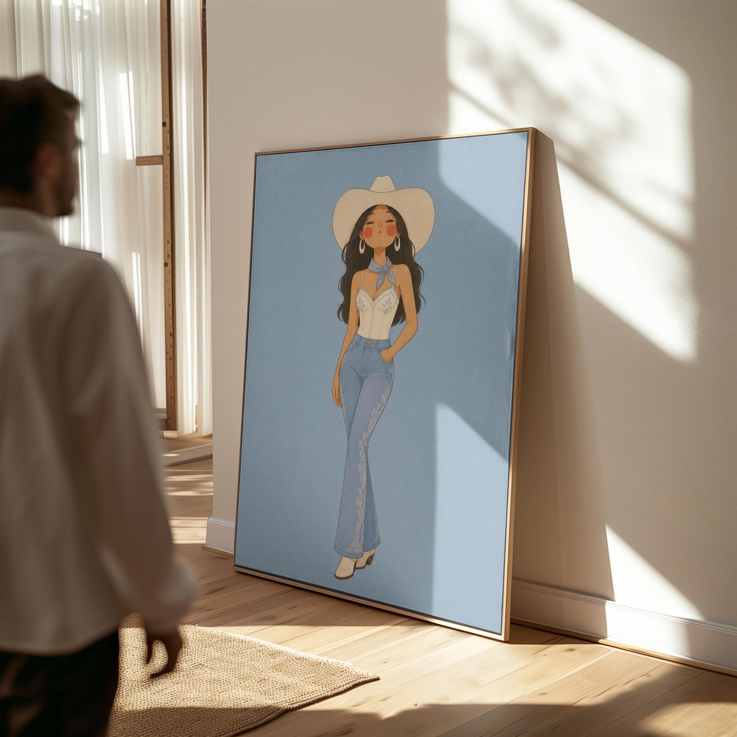 Cowgirl in flare jeans and white top against a dusty blue field, canvas print presented in a light, minimal room