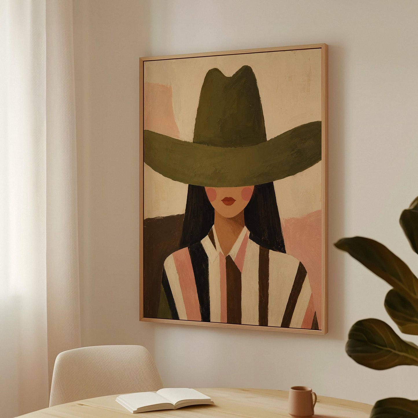 Faceless cowgirl portrait under a broad olive green hat, canvas print styled against a soft white wall
