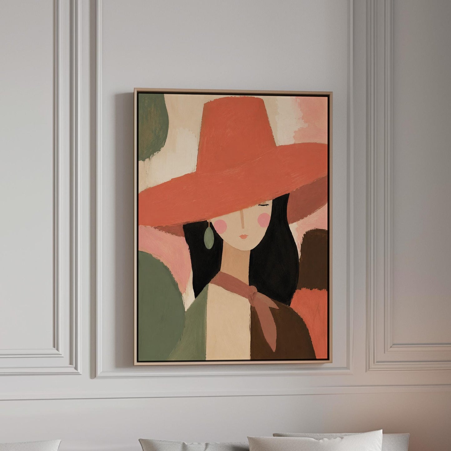 Woman in a wide coral hat with jade earring on blocked color, canvas print in a bright room with natural daylight