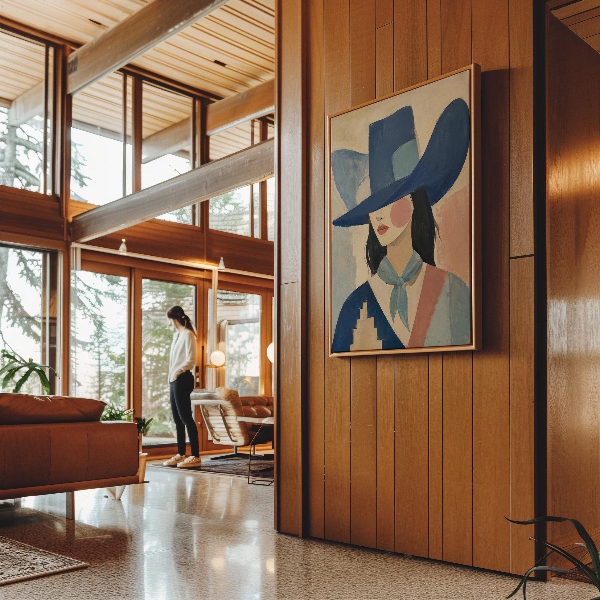 Cowgirl in a deep blue hat and pale scarf on a soft abstract ground, canvas print styled against a soft white wall