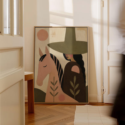 Pink horse beside a cowgirl in an olive hat with leaf motifs, canvas print shown to scale in a furnished room