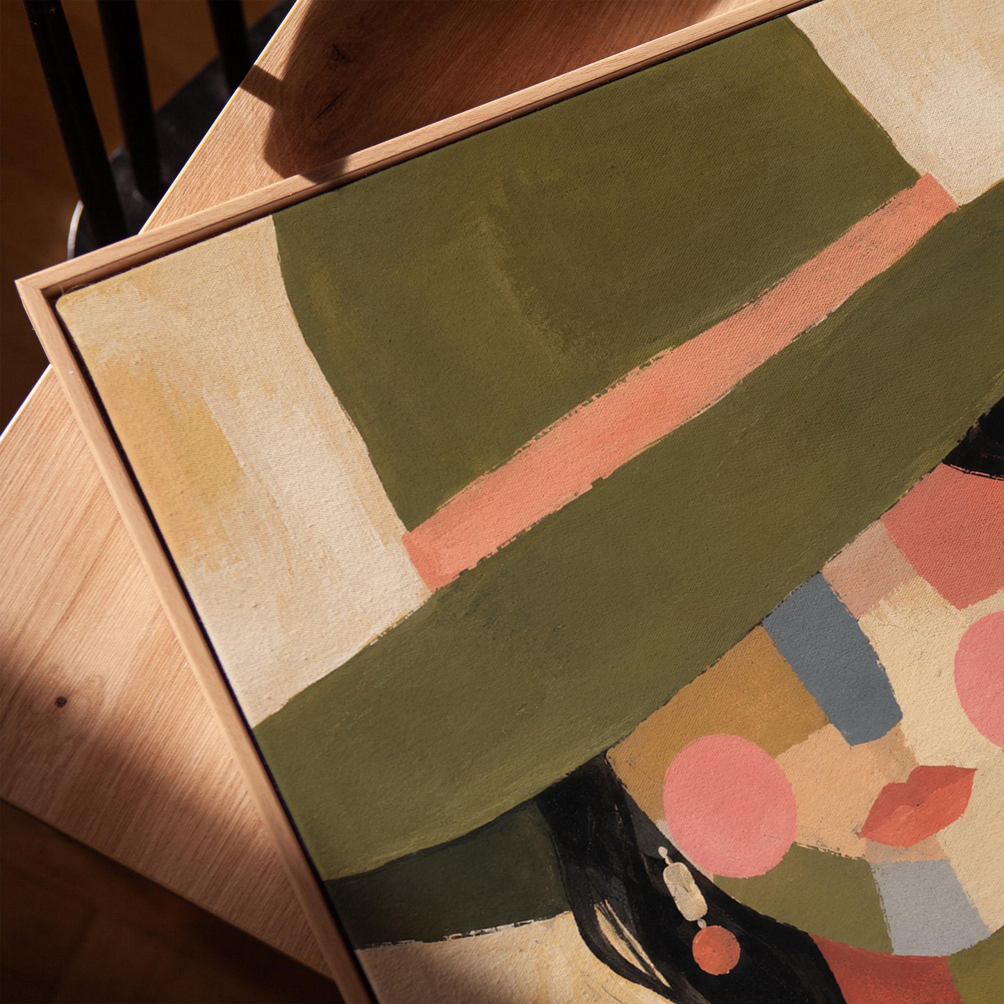 Cowgirl in olive hat with a patchwork face of soft color blocks, canvas print in a warm, minimally styled interior
