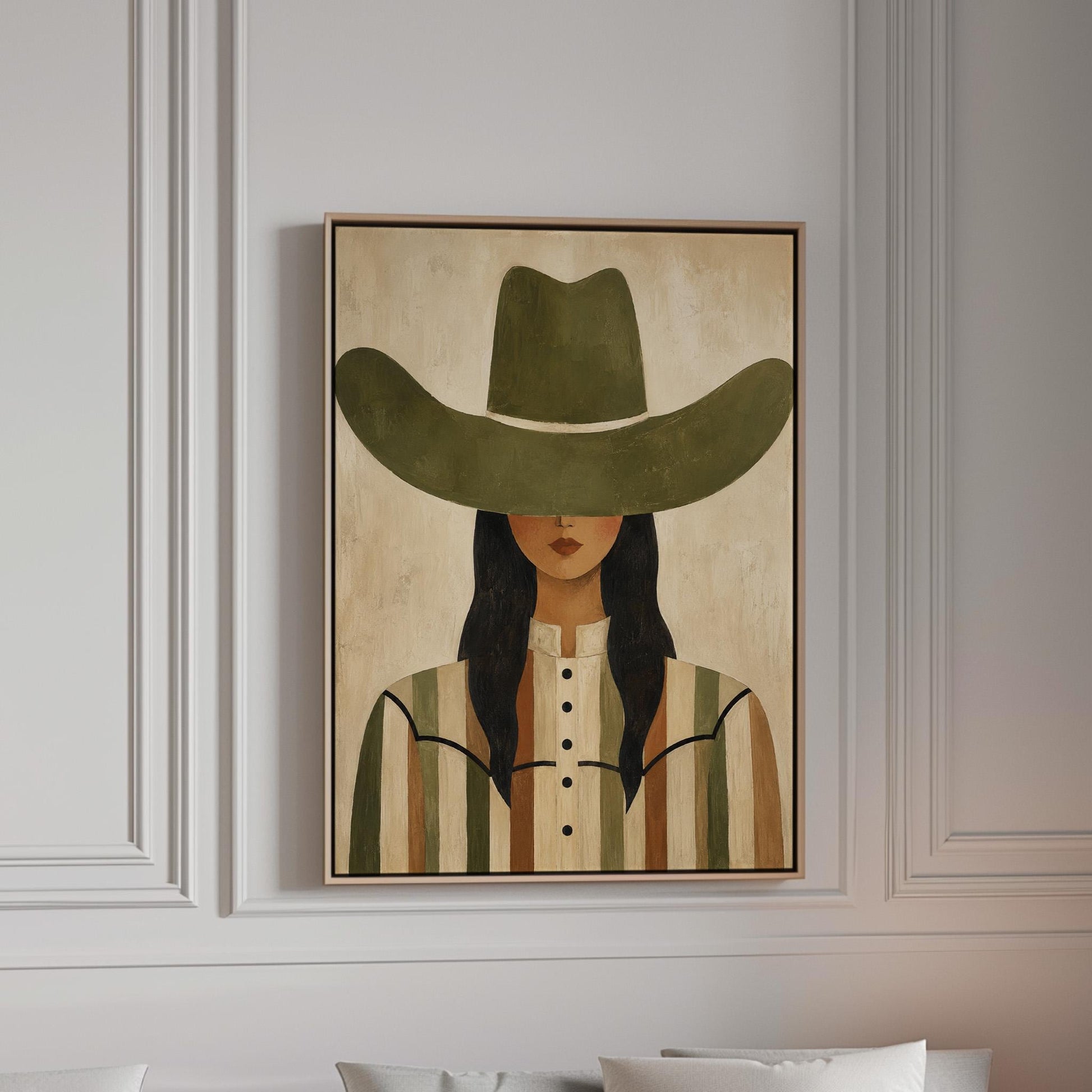 Cowgirl in olive hat and striped western shirt on sandy beige, canvas print in a bright room with natural daylight