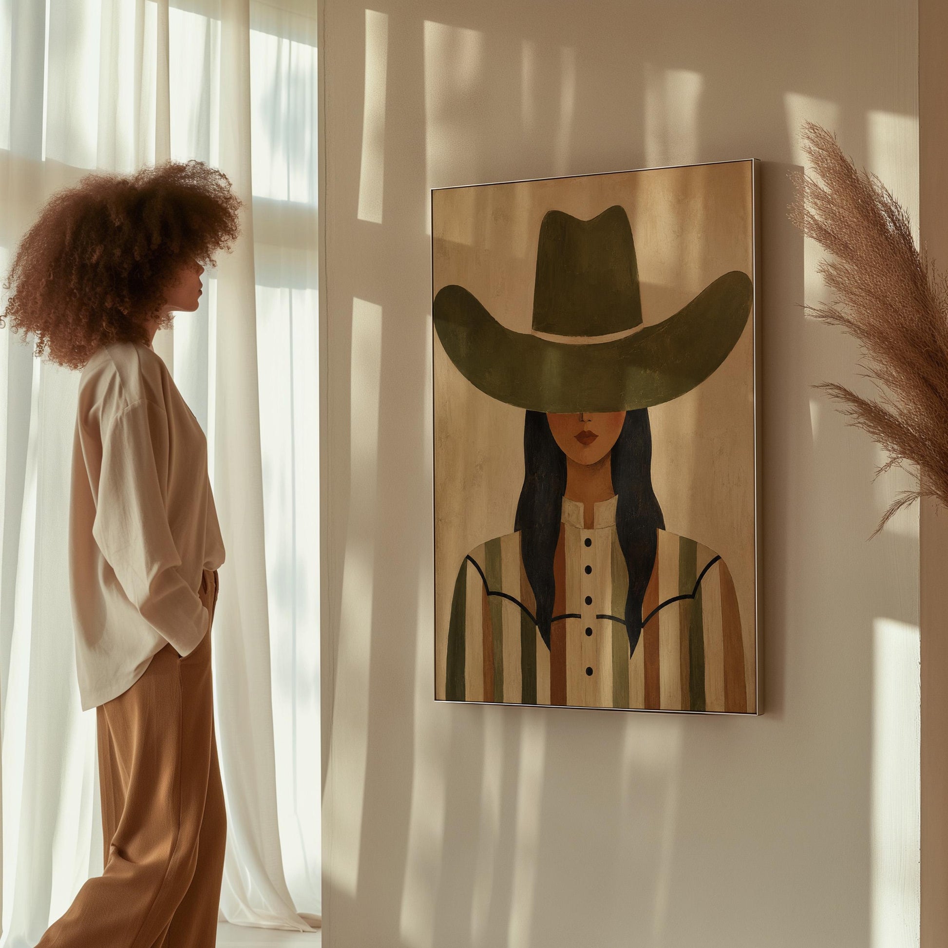 Cowgirl in olive hat and striped western shirt on sandy beige, canvas print shown to scale in a furnished room