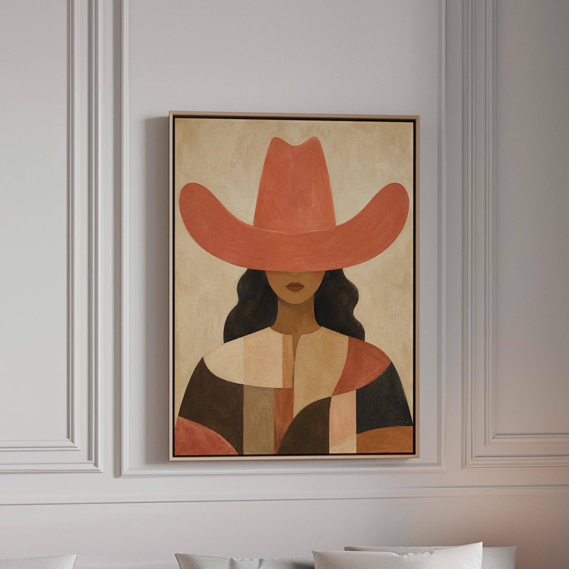 Cowgirl in a broad terracotta hat and patchwork western shirt, canvas print in a bright room with natural daylight
