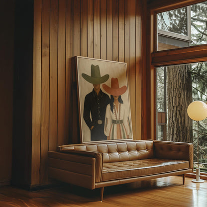 Cowboy and cowgirl standing side by side with hats tipped low, canvas print displayed on a neutral wall in a styled interior